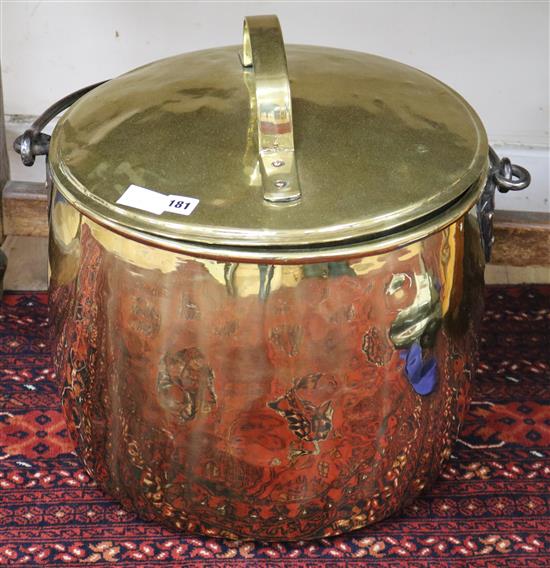 A large Victorian brass pail and cover, with wrought iron handle height 45cm
